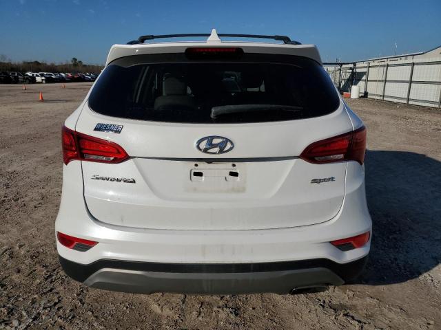 Photo 6 from auction – 2018 HYUNDAI SANTA FE S with VIN 5NMZU3LB4JH088109