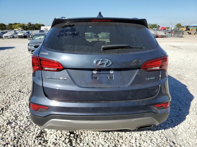 Photo 6 from auction – 2017 HYUNDAI SANTA FE S with VIN 5NMZU3LB6HH010716