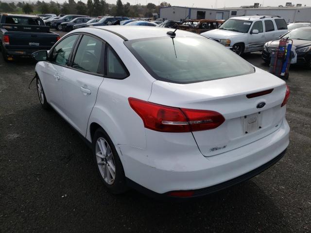 Photo 2 from auction – 2018 FORD FOCUS SE with VIN 1FADP3F24JL205558