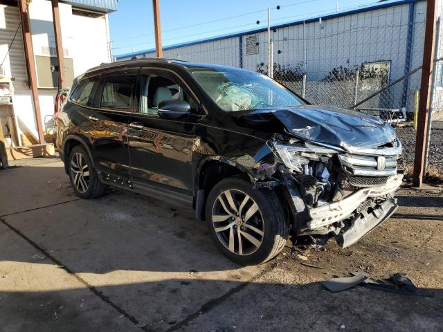 Photo 4 from auction – 2016 HONDA PILOT ELIT with VIN 5FNYF6H05GB023553