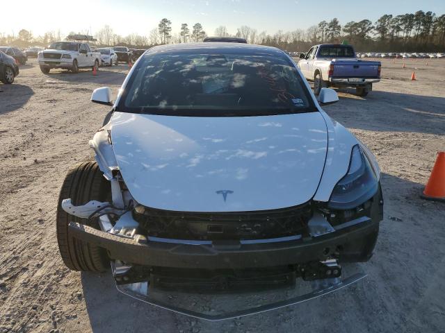 Photo 5 from auction – 2022 TESLA MODEL 3 with VIN 5YJ3E1EC2NF273960