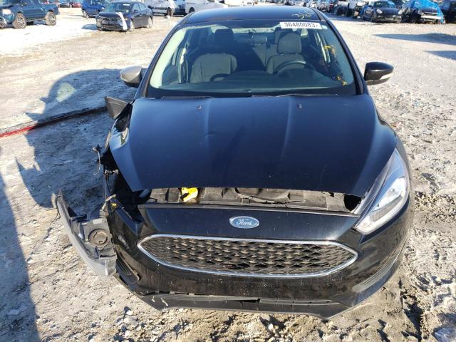 Photo 11 from auction – 2016 FORD FOCUS SE with VIN 1FADP3F20GL222477