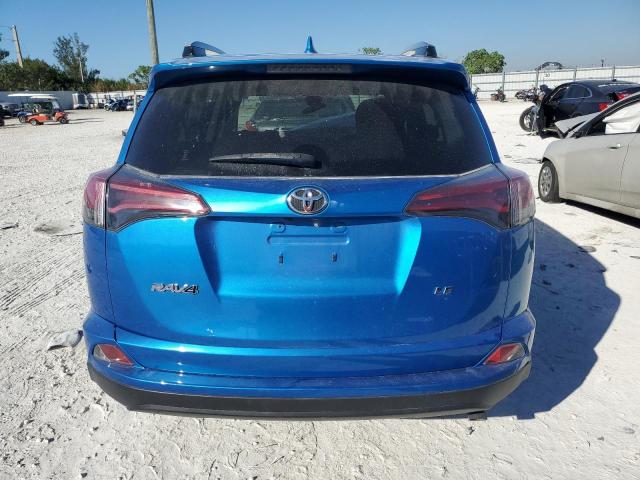 Photo 6 from auction – 2018 TOYOTA RAV4 LE with VIN JTMZFREV1JJ150869