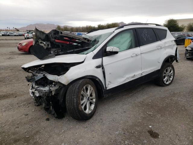 FORD ESCAPE SE 2018 with VIN 1FMCU9GD6JUA42063 - Photo from auction
