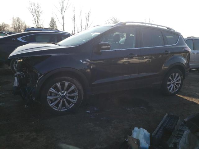 FORD ESCAPE TIT 2018 with VIN 1FMCU9J94JUD30703 - Photo from auction