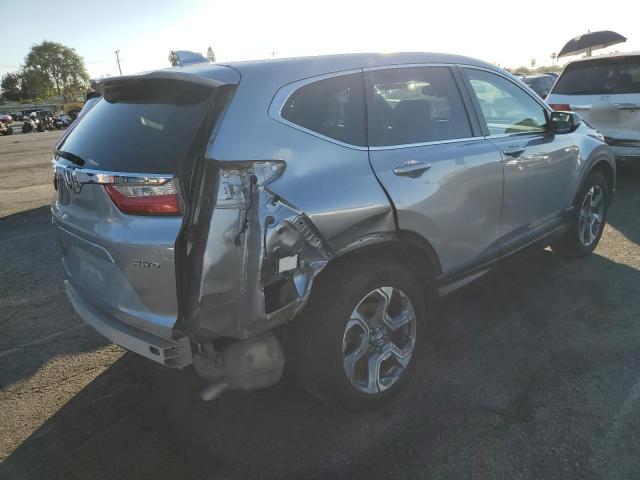 Photo 3 from auction – 2018 HONDA CR-V EXL with VIN 7FARW2H86JE092055