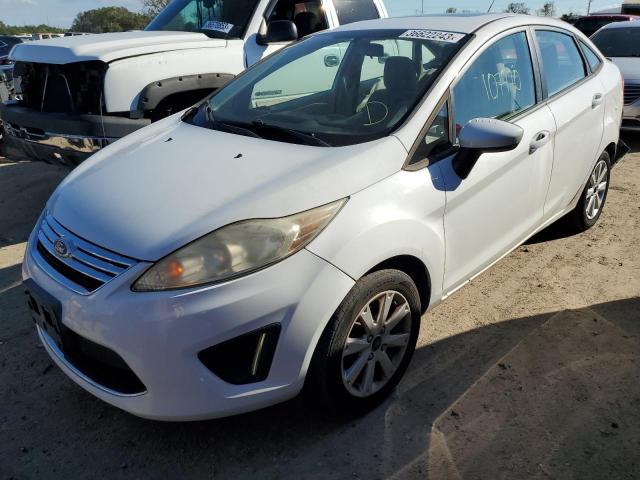 FORD FIESTA SE 2011 with VIN 3FADP4BJ9BM128978 - Photo from auction