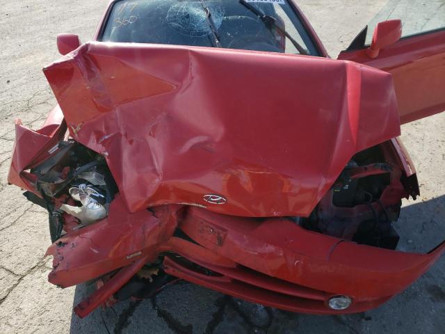 Photo 11 from auction – 2004 HYUNDAI TIBURON with VIN KMHHM65D84U136523