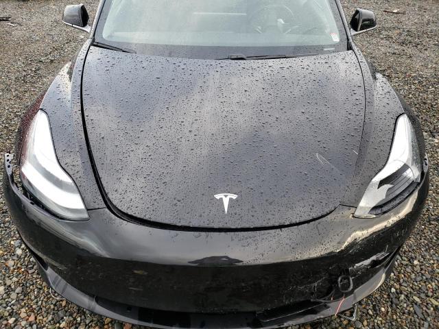 Photo 11 from auction – 2019 TESLA MODEL 3 with VIN 5YJ3E1EA1KF316694