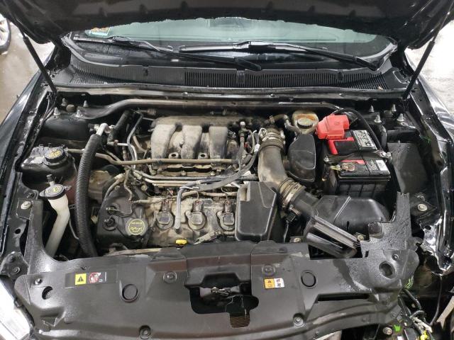 Photo 11 from auction – 2015 FORD TAURUS SEL with VIN 1FAHP2E85FG203349