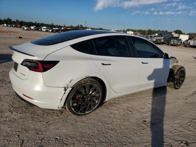 Photo 3 from auction – 2022 TESLA MODEL 3 with VIN 5YJ3E1EC2NF273960