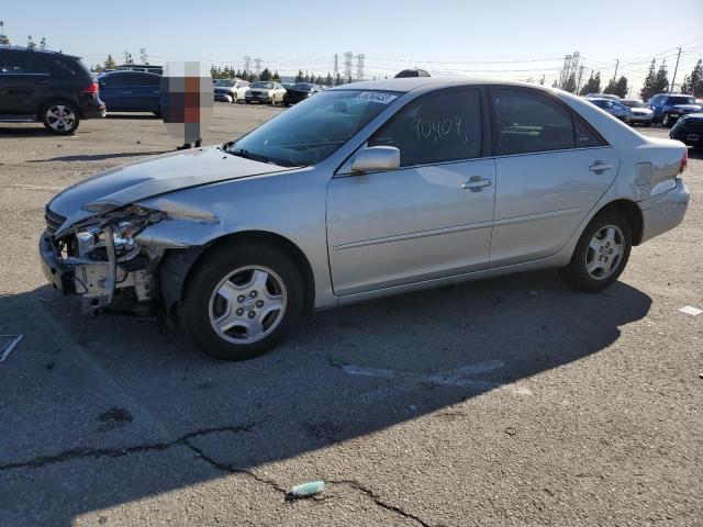 TOYOTA CAMRY LE 2003 with VIN 4T1BF32K73U563045 - Photo from auction