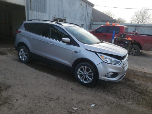 Photo 4 from auction – 2018 FORD ESCAPE SE with VIN 1FMCU0GD9JUC47677