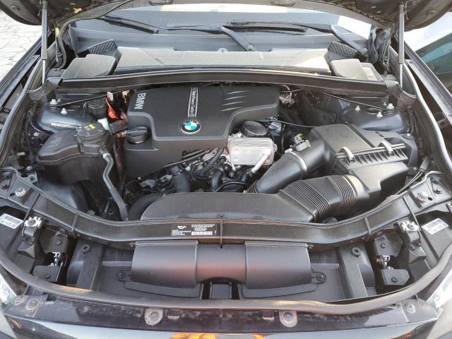 Photo 11 from auction – 2015 BMW X1 SDRIVE2 with VIN WBAVM1C56FVZ94587