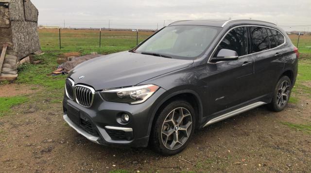 Photo 2 from auction – 2018 BMW X1 XDRIVE2 with VIN WBXHT3Z39J4A66331