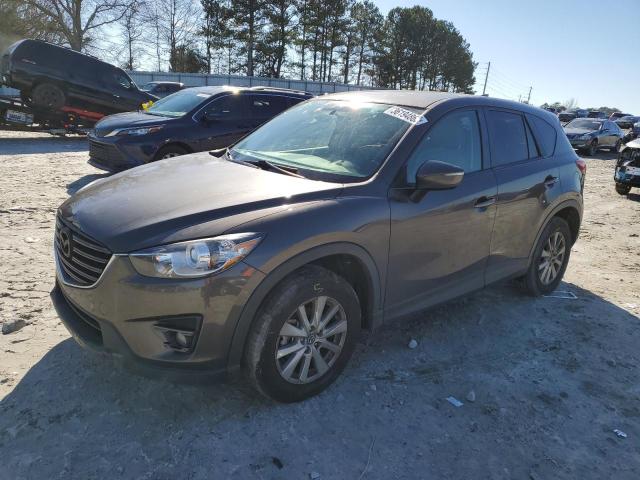 MAZDA CX-5 TOURI 2016 with VIN JM3KE2CY3G0845112 - Photo from auction