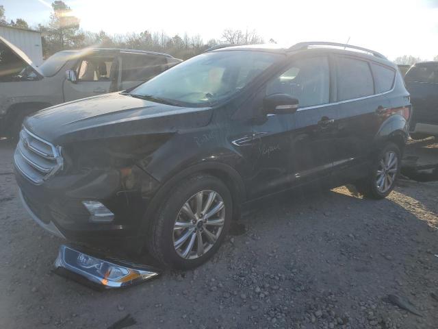 FORD ESCAPE TIT 2017 with VIN 1FMCU0J94HUA75458 - Photo from auction