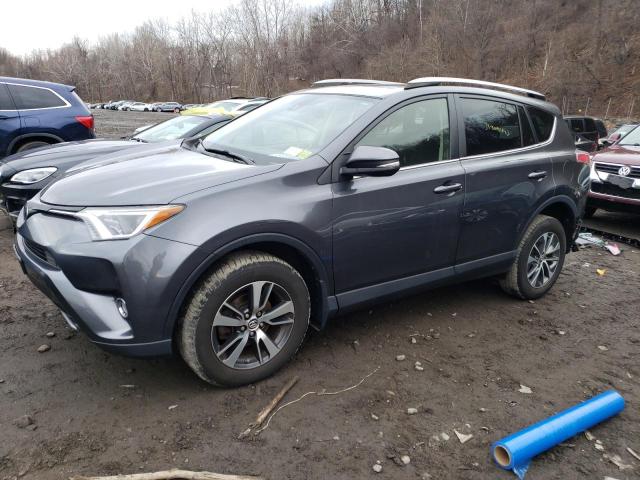 TOYOTA RAV4 XLE 2017 with VIN JTMRFREV5HD211116 - Photo from auction