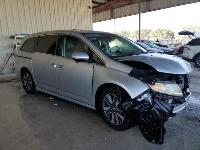 Photo 4 from auction – 2014 HONDA ODYSSEY TO with VIN 5FNRL5H90EB068029