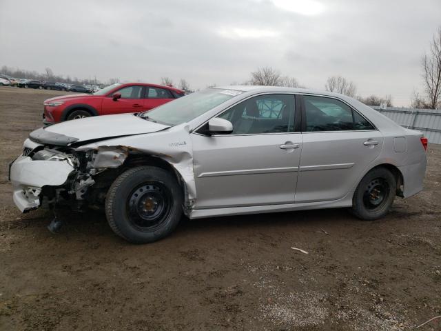 TOYOTA CAMRY HYBR 2014 with VIN 4T1BD1FK9EU129135 - Photo from auction