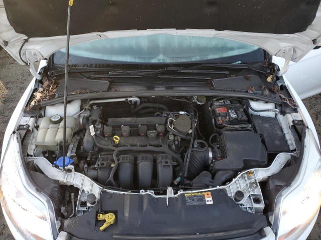 Photo 11 from auction – 2013 FORD FOCUS SE with VIN 1FADP3F23DL297993