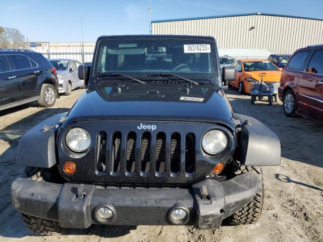 Photo 5 from auction – 2013 JEEP WRANGLER U with VIN 1C4BJWDG0DL519814