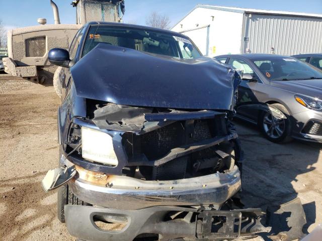 Photo 5 from auction – 2003 FORD F150 SUPER with VIN 1FTRW08L13KB92476