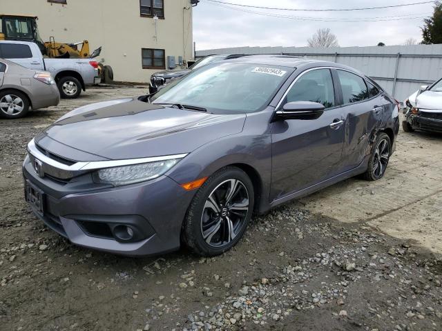 HONDA CIVIC TOUR 2016 with VIN 19XFC1F91GE205504 - Photo from auction