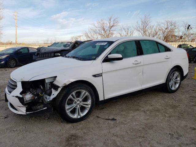 FORD TAURUS SEL 2014 with VIN 1FAHP2E81EG140975 - Photo from auction