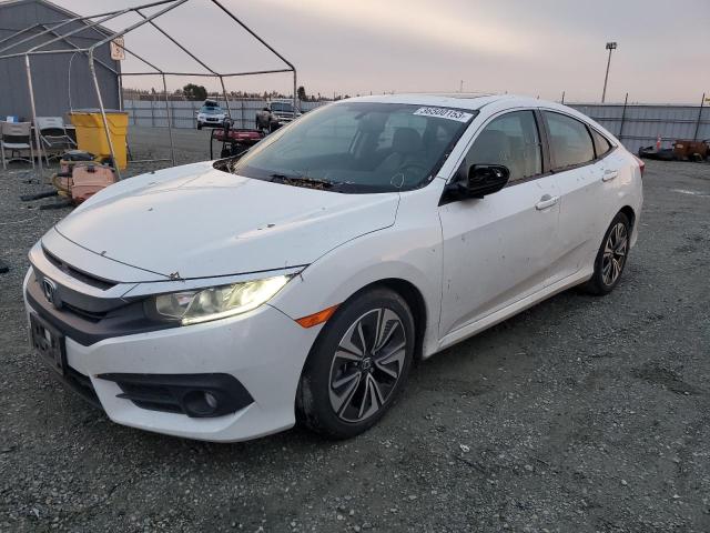 HONDA CIVIC EXL 2016 with VIN 2HGFC1F72GH650015 - Photo from auction