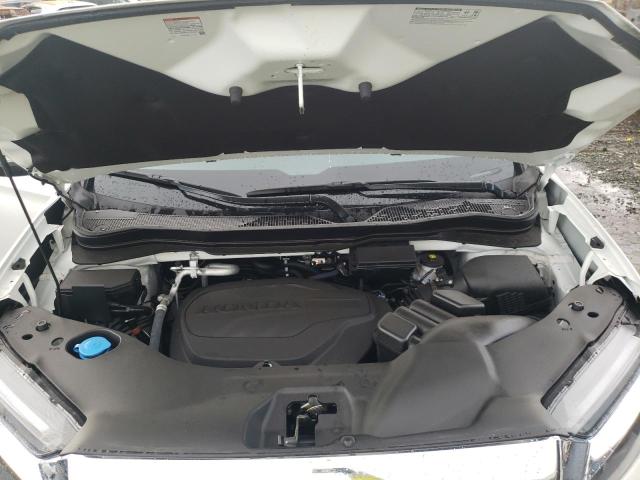 Photo 11 from auction – 2022 HONDA PASSPORT E with VIN 5FNYF8H52NB017326