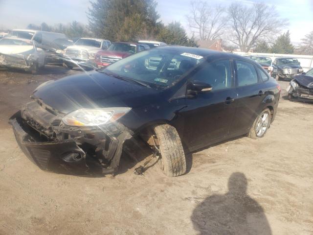 FORD FOCUS SE 2014 with VIN 1FADP3F24EL202522 - Photo from auction