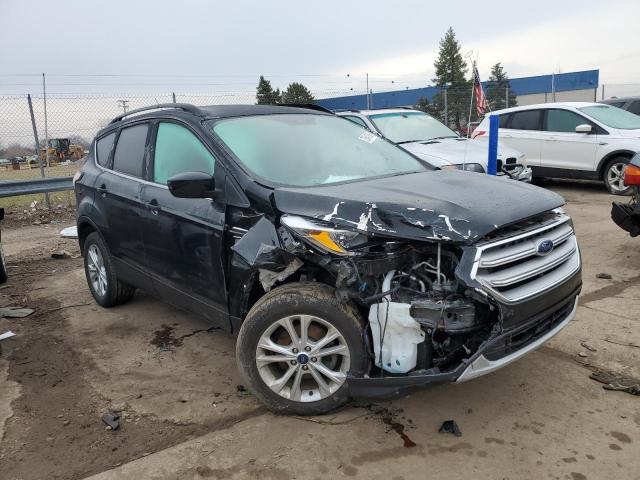 Photo 4 from auction – 2018 FORD ESCAPE SE with VIN 1FMCU0GD2JUC03973