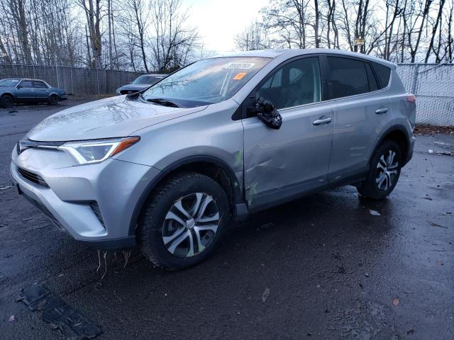 TOYOTA RAV4 LE 2018 with VIN 2T3BFREV7JW761380 - Photo from auction