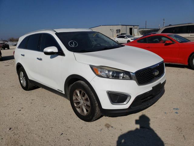 Photo 4 from auction – 2016 KIA SORENTO LX with VIN 5XYPGDA54GG135482
