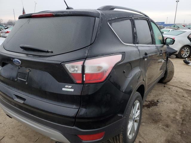 Photo 3 from auction – 2018 FORD ESCAPE SE with VIN 1FMCU0GD2JUC03973