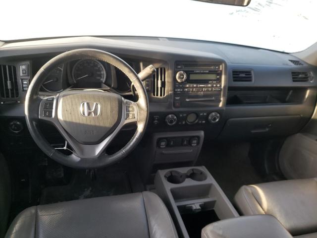 Photo 8 from auction – 2010 HONDA RIDGELINE with VIN 5FPYK1F56AB003212