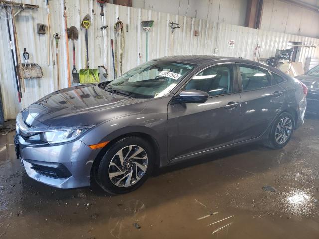 HONDA CIVIC EX 2017 with VIN 19XFC2F70HE044326 - Photo from auction