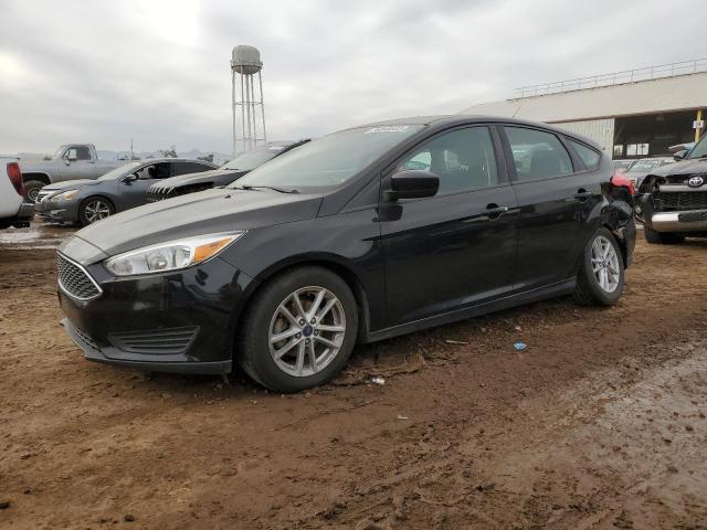 FORD FOCUS SE 2018 with VIN 1FADP3K29JL214875 - Photo from auction