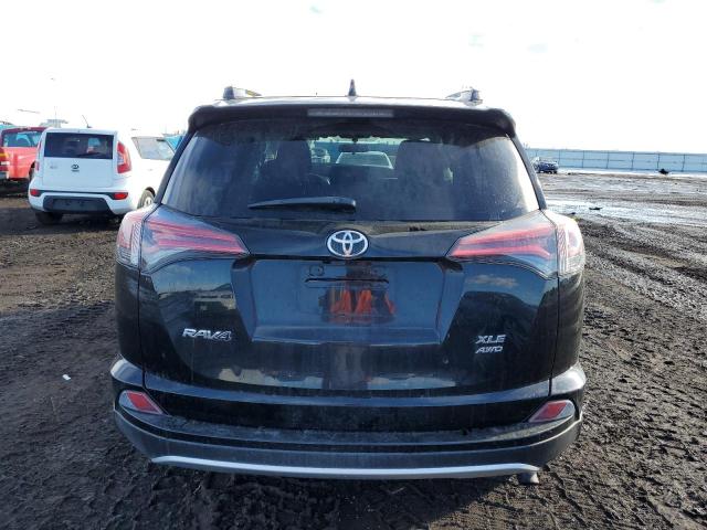 Photo 6 from auction – 2016 TOYOTA RAV4 XLE with VIN 2T3RFREV7GW435781