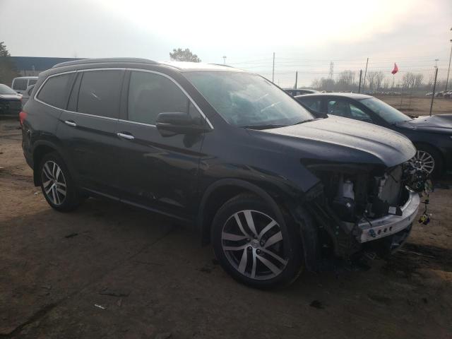 Photo 4 from auction – 2018 HONDA PILOT TOUR with VIN 5FNYF6H97JB012379
