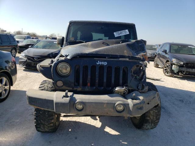 Photo 5 from auction – 2012 JEEP WRANGLER U with VIN 1C4BJWDG5CL256735