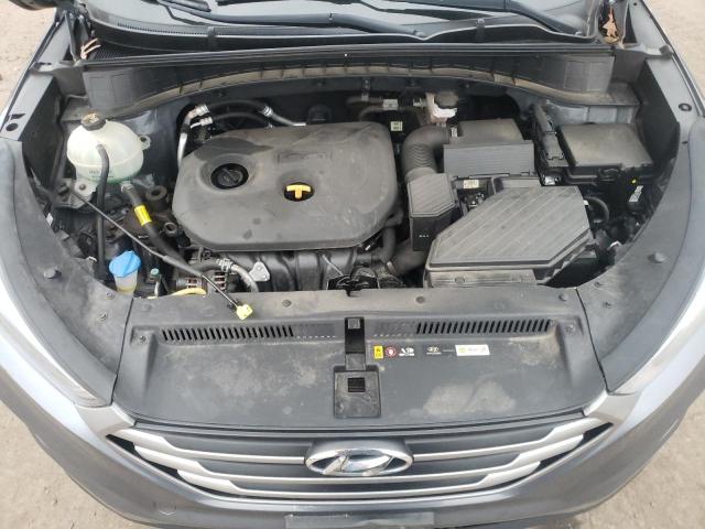 Photo 11 from auction – 2018 HYUNDAI TUCSON SE with VIN KM8J2CA41JU829456