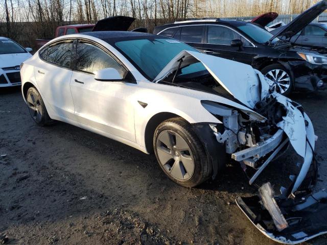 Photo 4 from auction – 2022 TESLA MODEL 3 with VIN 5YJ3E1EBXNF112036