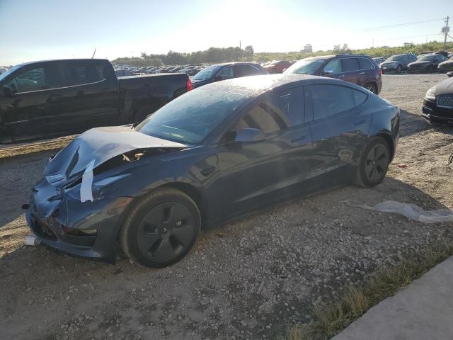 TESLA MODEL 3 2022 with VIN 5YJ3E1EB8NF113864 - Photo from auction