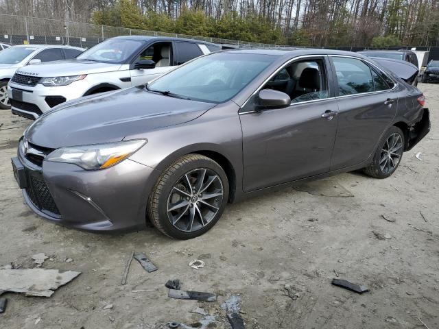 TOYOTA CAMRY LE 2015 with VIN 4T1BF1FK0FU497828 - Photo from auction