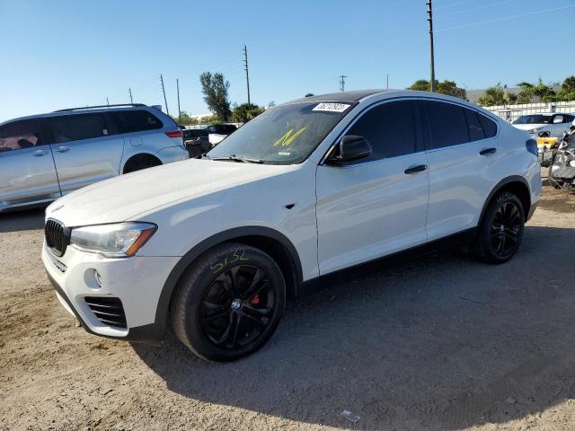 BMW X4 XDRIVE2 2015 with VIN 5UXXW3C57F0M88974 - Photo from auction