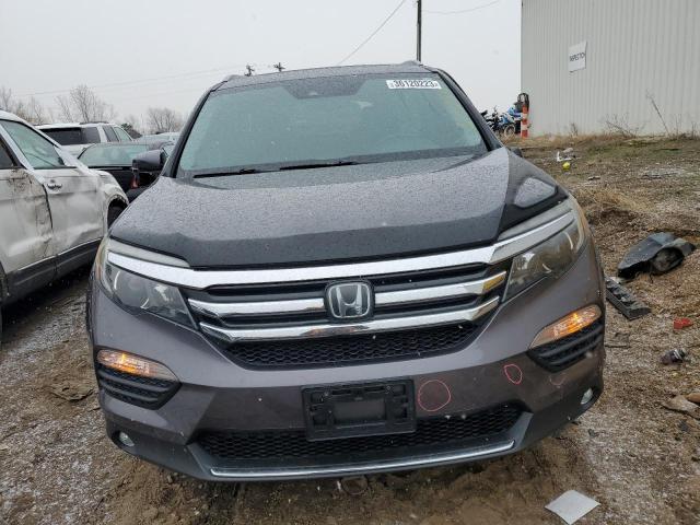 Photo 5 from auction – 2016 HONDA PILOT TOUR with VIN 5FNYF6H98GB058361