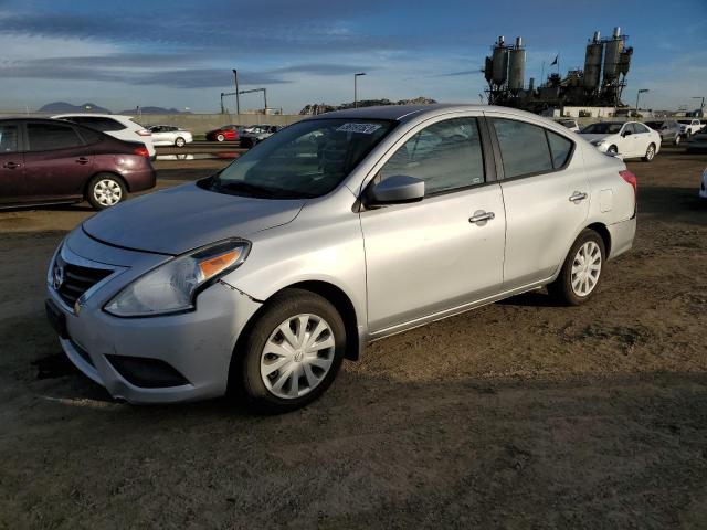 NISSAN VERSA S 2015 with VIN 3N1CN7APXFL897491 - Photo from auction