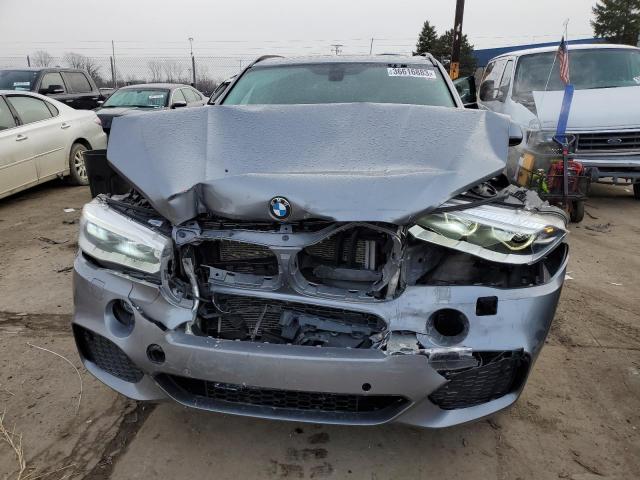 Photo 5 from auction – 2014 BMW X5 XDRIVE3 with VIN 5UXKR0C54E0K49011